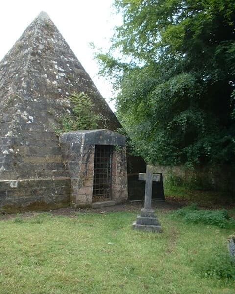 A pyramid structure in the british countryside.