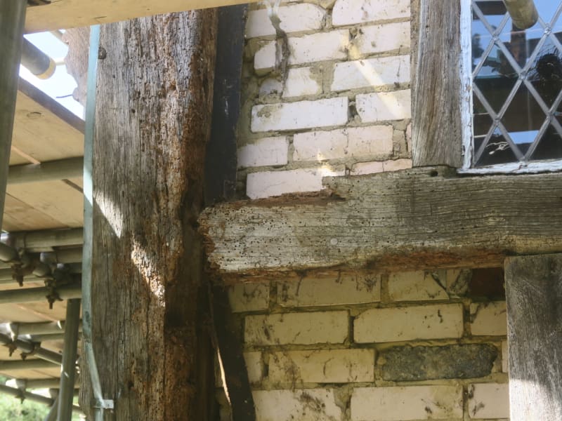 Timber framed building featuring beams.